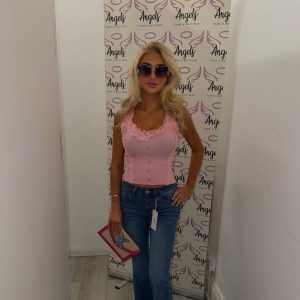 frilly vest with gold centred buttons